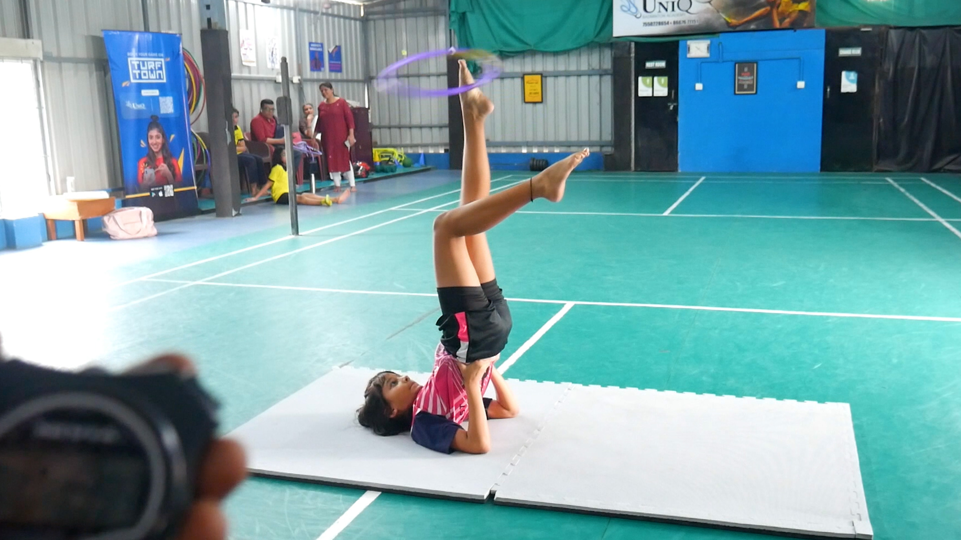 Video thumbnail for Most hula hoop rotations on the foot in the candle position in 30 seconds  117 by Saanvi Agarwal