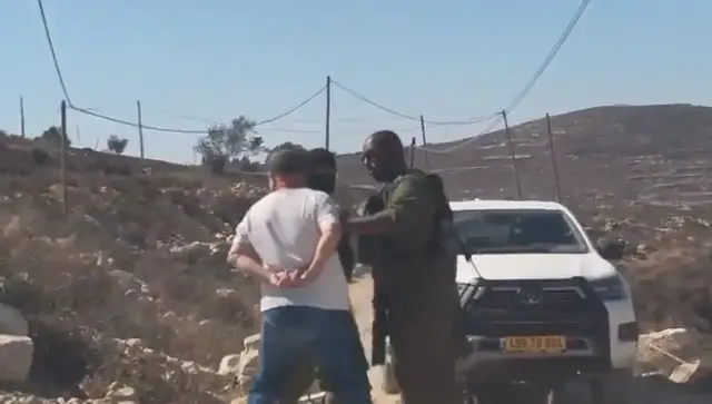 Video thumbnail for Israeli soldiers block Knesset member from besieged Palestinian home