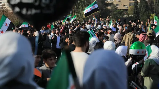 Video thumbnail for Syrians gather to celebrate first anniversary of Assad’s fall