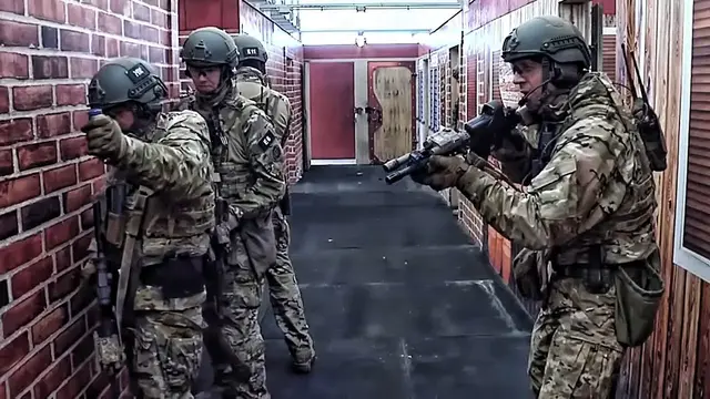 Video thumbnail for FBI SWAT Team Practices Clearing Rooms In The Shoot-House