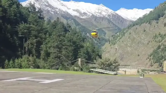 Video thumbnail for India: Helicopters Rescue Trekkers Stranded on Himalayan Route by Heavy Snow.