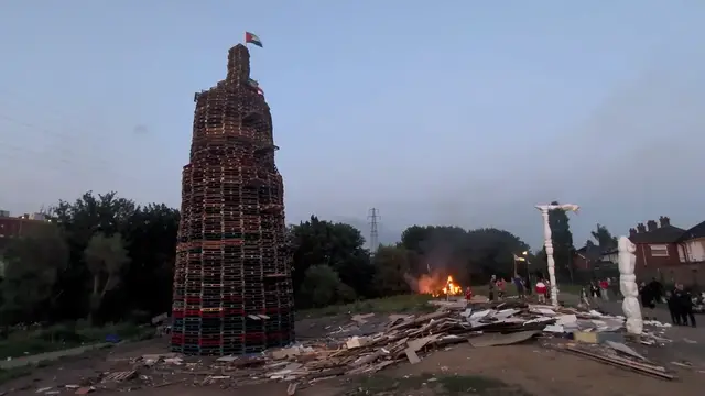 Video thumbnail for Anti-migrant display set alight in Northern Ireland bonfire