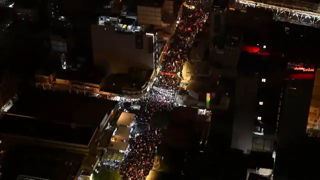 Video thumbnail for Iraq: Drone captures massive crowds gathering for Ali Khamenei funeral in Iraq's Karbala.