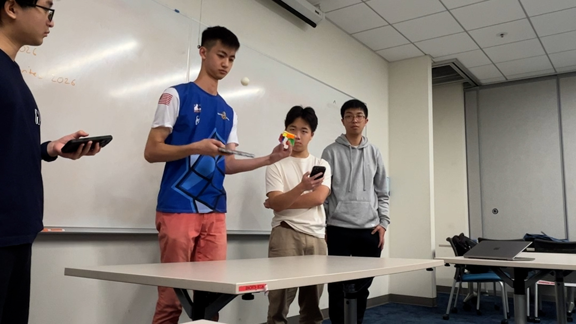 Video thumbnail for Fastest time to solve a rotating puzzle cube while controlling a table tennis ball  11.96 seconds by Ethan Jan