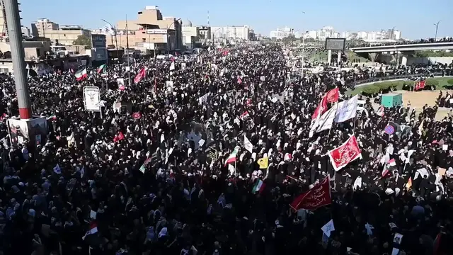 Video thumbnail for Iraq: Thousands gather in Iraq for funeral procession of slain Iranian leader Khamenei (3).