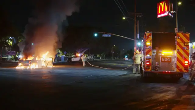 Video thumbnail for US, Los Angeles: Gramercy Park Car Set on Fire at Street Takeover.