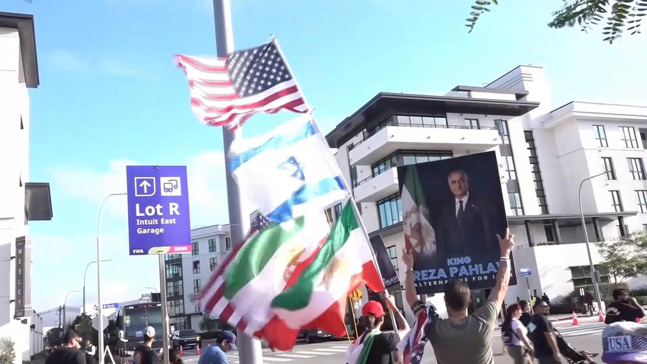 Video thumbnail for US: Iranian opposition symbols on display before World Cup match in Los Angeles.