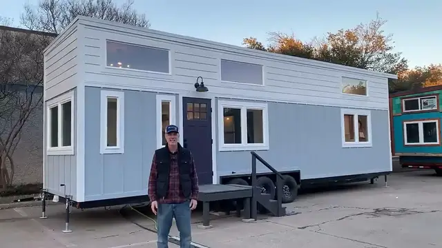 'Video thumbnail for Downstairs master bedroom in this precious Tiny Home on Wheels'