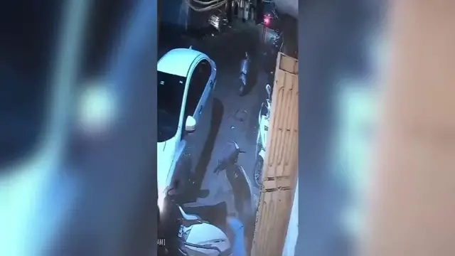 Video thumbnail for India: Speeding car loses control on road, crashes into three residents seated outside home.