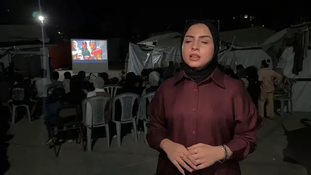 Video thumbnail for Mobile cinema initiative offers Gaza's displaced children temporary escape amid rubble.