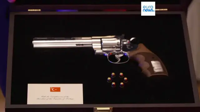 Video thumbnail for Newly released footage shows revolver gifted by Erdogan to NATO leaders