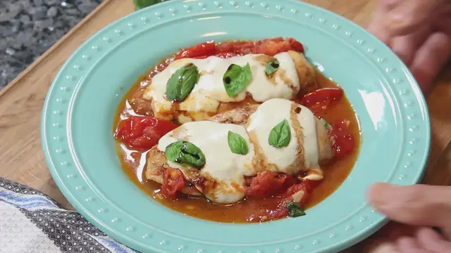 'Video thumbnail for Caprese Chicken - Melted Cheese over Tomato Sauce'