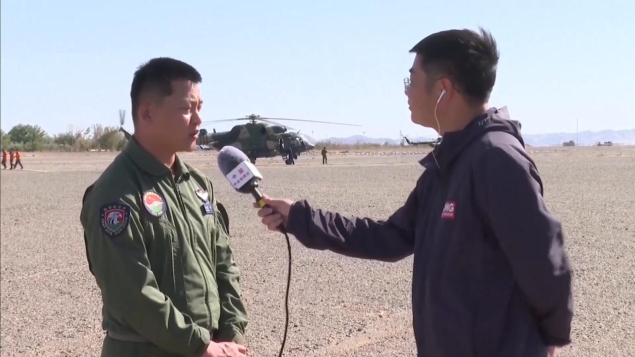 Video thumbnail for China: Recovery helicopters complete assembly for upcoming return of Shenzhou-21 astronauts.