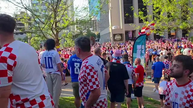 Video thumbnail for US: Croatia Fans Take Over Downtown Dallas In Massive Red And White March.