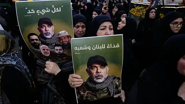 Video thumbnail for Residents of Beirut suburb hit by Israeli airstrike says attack 'increases their resolve'