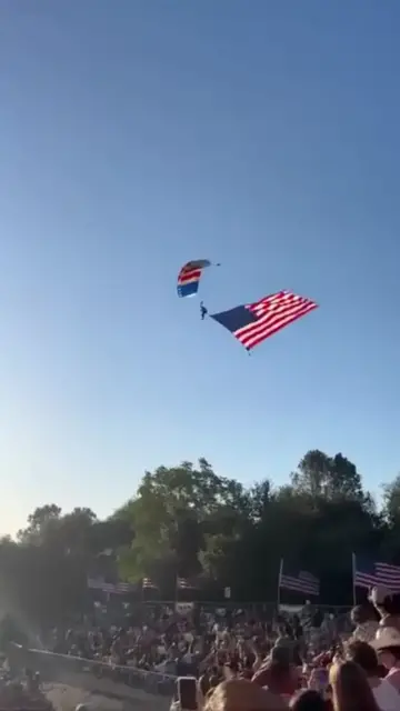 Video thumbnail for Skydiver with Giant Flag Makes Wild Landing at Folsom Rodeo
