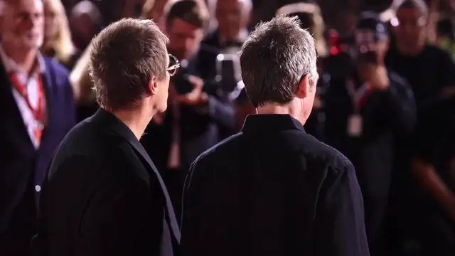 Video thumbnail for Italy: 'Oasis: Don't Look Back in Anger' premieres at Venice Film Festival.