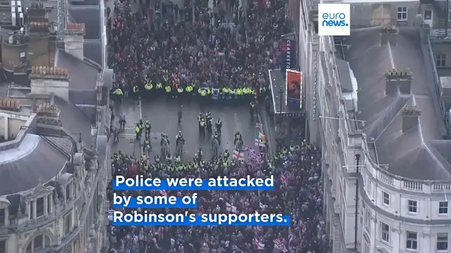 'Video thumbnail for Police assaulted during massive London march organised by far-right activist Tommy Robinson'