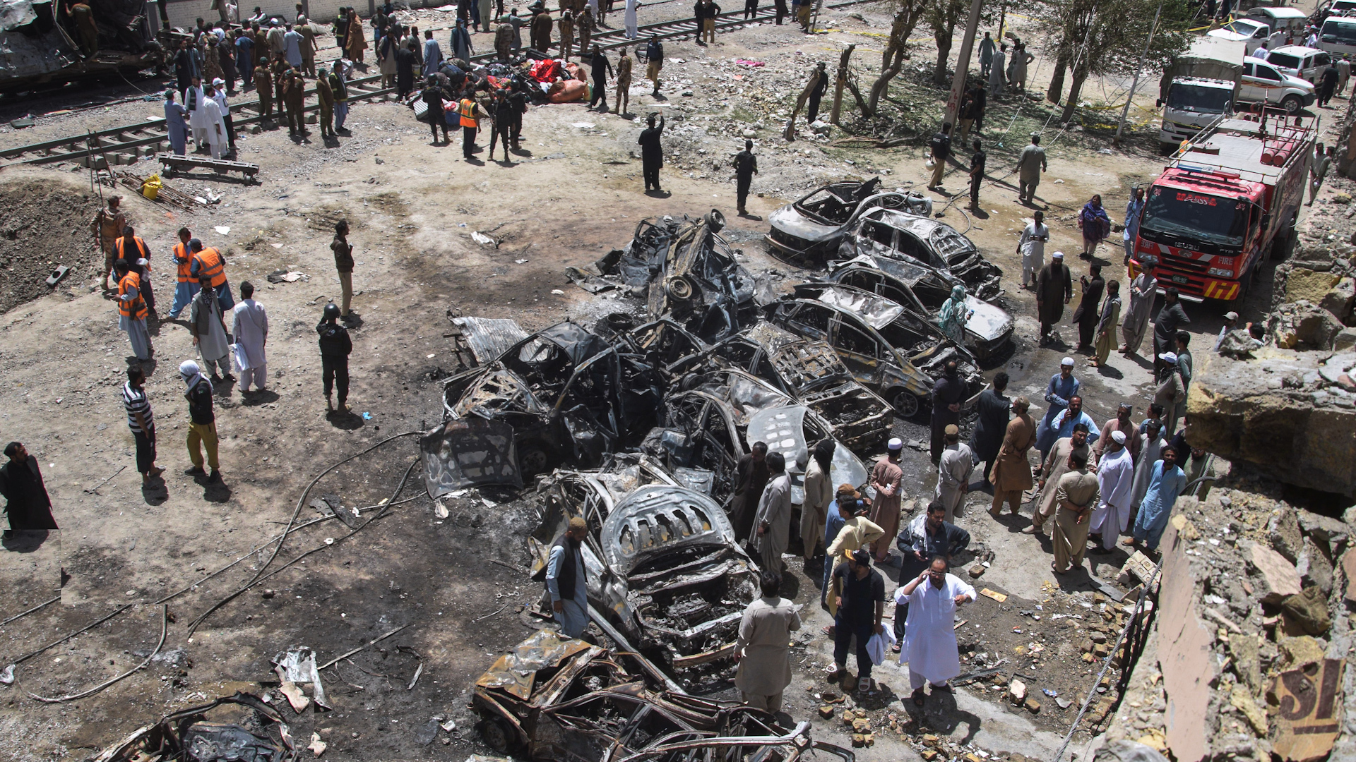 Video thumbnail for Suicide car bombing attack on a train in Pakistan kills dozens