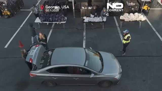 'Video thumbnail for US food stamp cuts: hundreds line up for food aid as funding freeze nears'