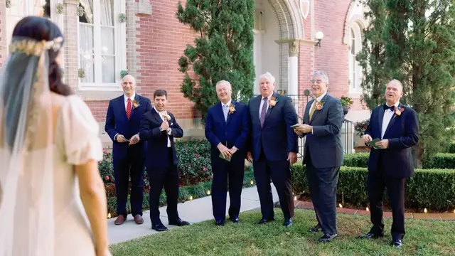 'Video thumbnail for Bride Who Lost Dad Ten Years Ago Has Emotional First-Look At Wedding With All The Men In Her Life'