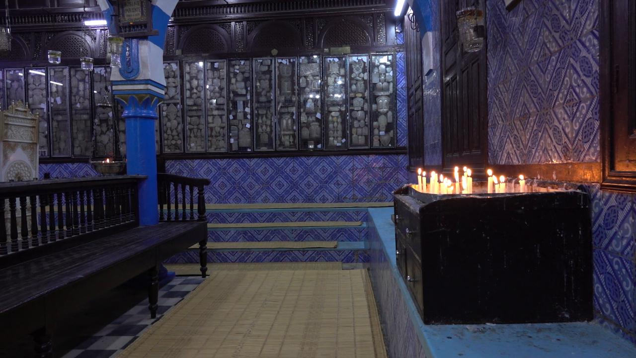 Video thumbnail for Tunisia: Jewish pilgrim prays inside the historic Ghriba synagogue.