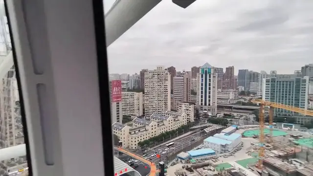 Video thumbnail for China: China First Cantilever Rooftop Ferris Wheel.