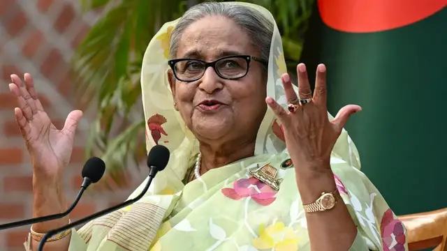 Video thumbnail for Sheikh Hasina says she will return to Bangladesh in December