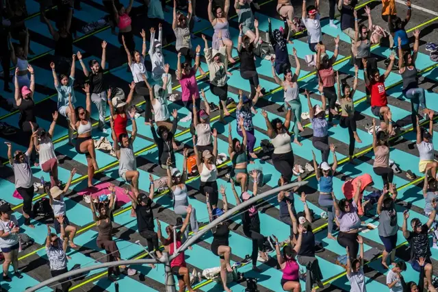 Video thumbnail for New York City welcomes the summer solstice with Times Square yoga