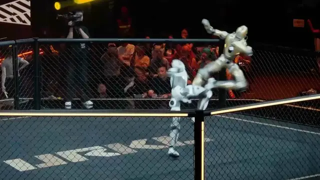 Video thumbnail for Humanoid robots fight in cage match in Shanghai