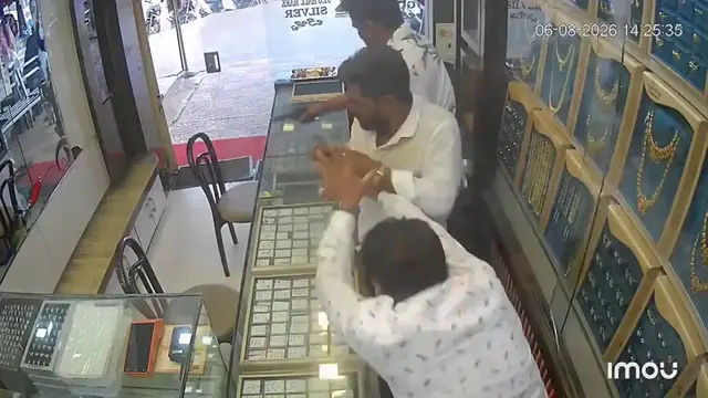 Video thumbnail for India: Gold shop owner shot as armed gang posing as customers attempts robbery, probe underway.