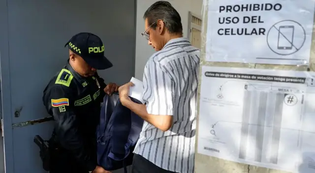 Video thumbnail for Colombians vote for president amid security fears and rival visions for peace