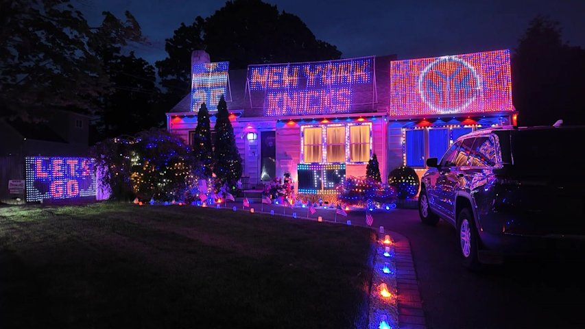 Video thumbnail for Knicks fan celebrates NBA win with blue and orange LED light display of Deer Park home