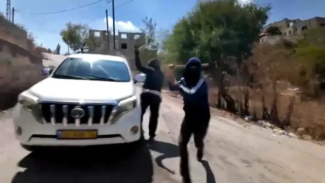 Video thumbnail for Israeli settlers attack international news team in occupied West Bank