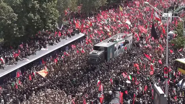 Video thumbnail for Iran: Body of Iran’s former Supreme Leader Khamenei carried in Tehran funeral procession (2).