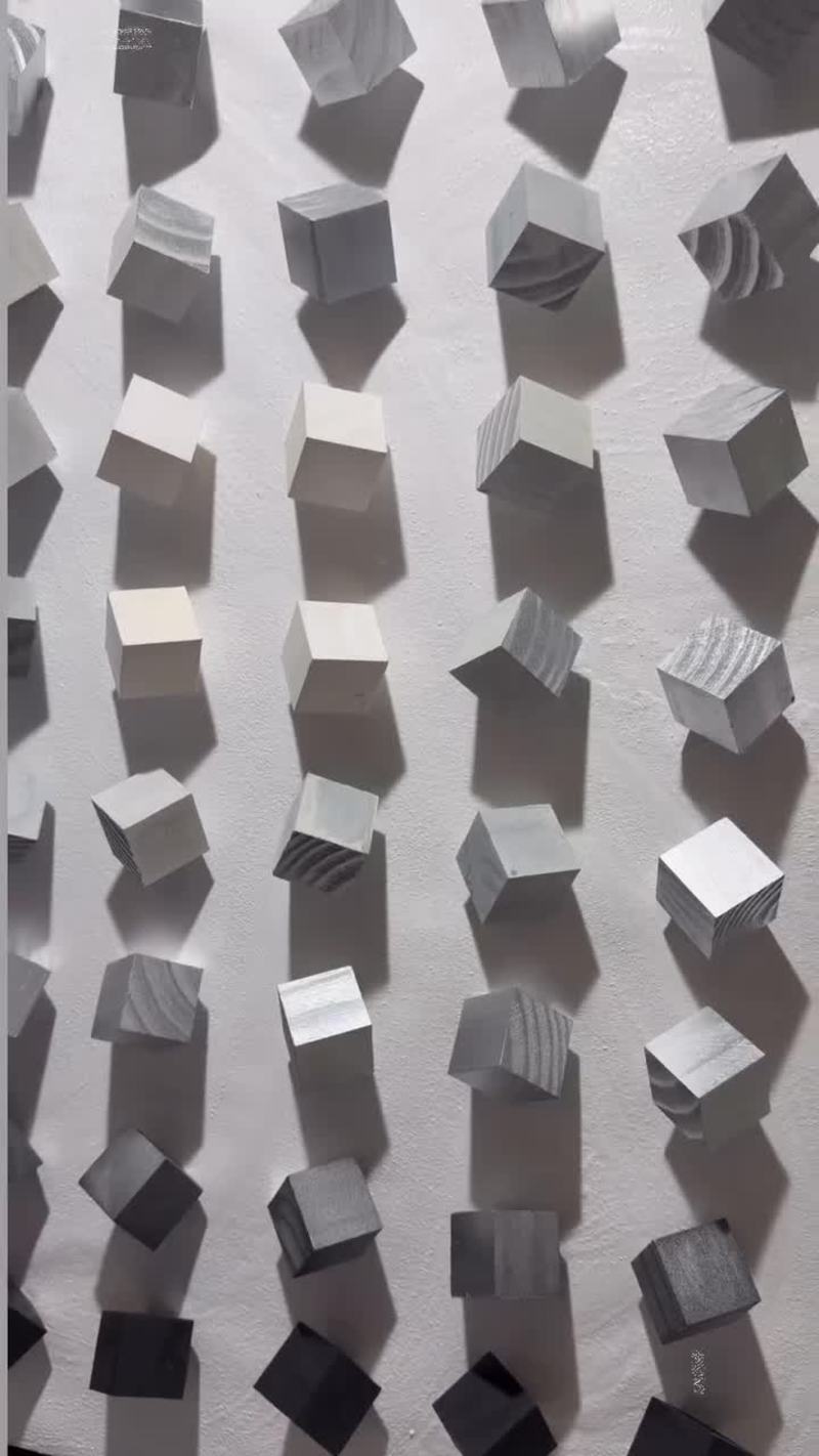 Video thumbnail for Mesmerizing Kinetic Wall of Rotating Cubes