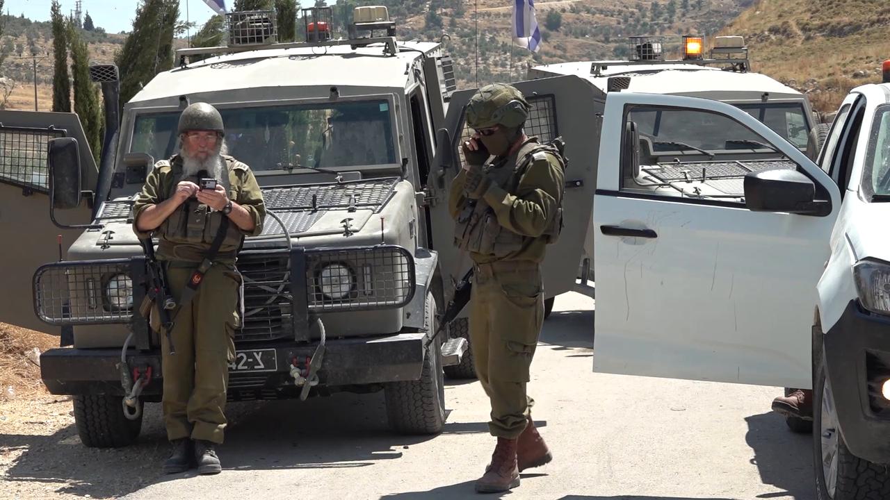 Video thumbnail for Palestinians offer Friday prayers on land threatened by Israeli occupier attacks.