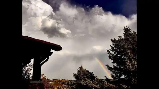 Video thumbnail for US: Double Rainbow Appears Over Golden After Storm Delays Rockies Game at Coors Field.