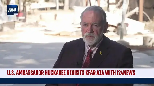 'Video thumbnail for US Ambassador Huckabee revisits Kfar Aza with i24NEWS'