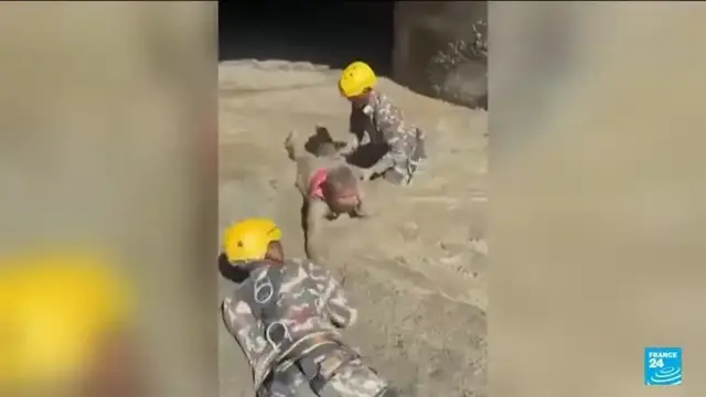 Video thumbnail for Nepal flood survivors rescued from hydropower tunnel
