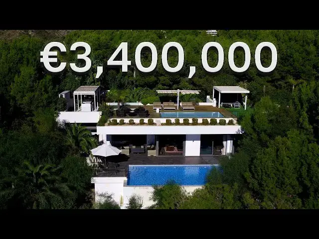 'Video thumbnail for Touring a €2,900,000 modern villa in SPAIN with a tropical roof deck - Darcy Maxim'