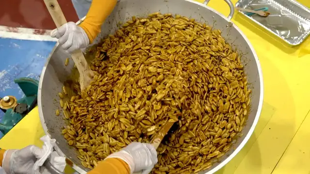 'Video thumbnail for Largest nut brittle - 144.16 m² (1,551 ft² 104 in²) by Province of Sorsogon'