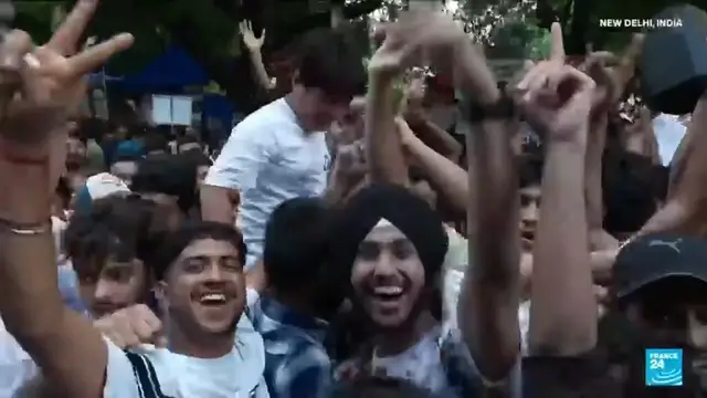 Video thumbnail for India protesters celebrate as education minister resigns, Modi announces exam system reform
