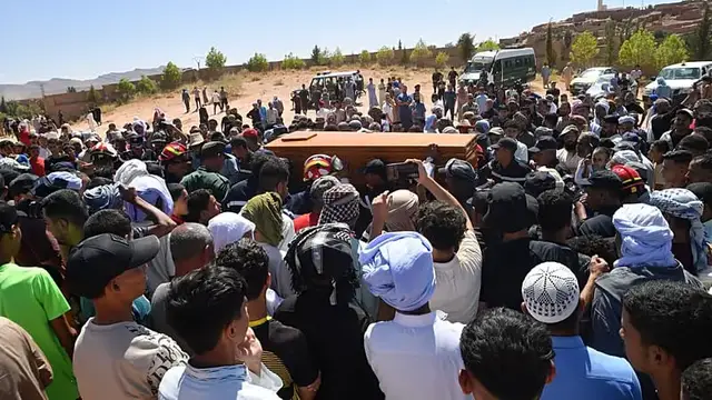 Video thumbnail for Mourners in Algeria bid farewell to 10-year-old boy trapped for days in well