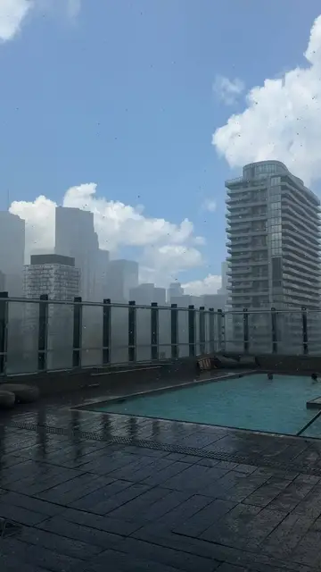 Video thumbnail for Summer Hailstorm over a Toronto Rooftop Pool
