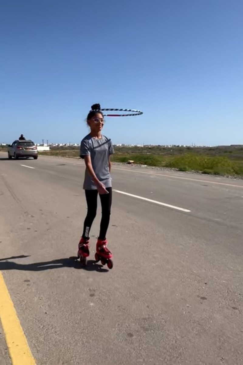 Video thumbnail for Longest duration roller/inline skating while hula hooping around a hair bun  28 minutes and 2 seconds by Shivanya Prashanth