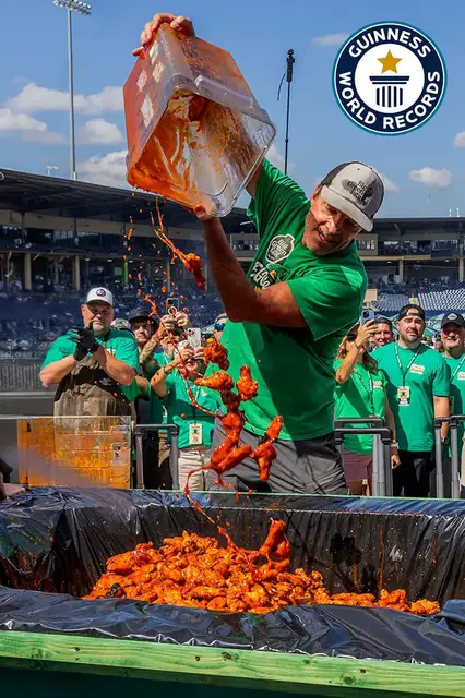 Video thumbnail for Big green egg breaks record for largest chicken wings serving