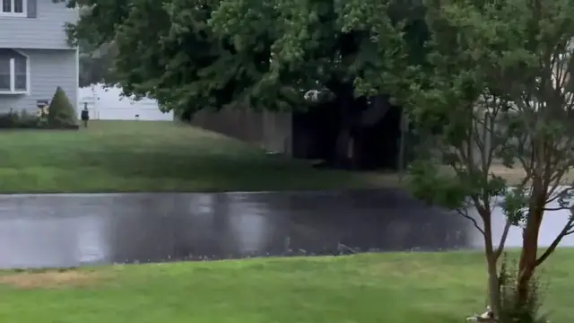 Video thumbnail for US: Thunderstorm Brings Heavy Rain to East Islip, NY.