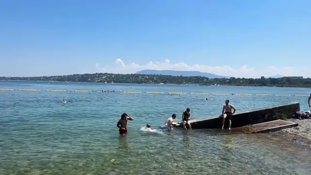 Video thumbnail for Switzerland: Swiss residents cool off in lakes as heatwave grips country.