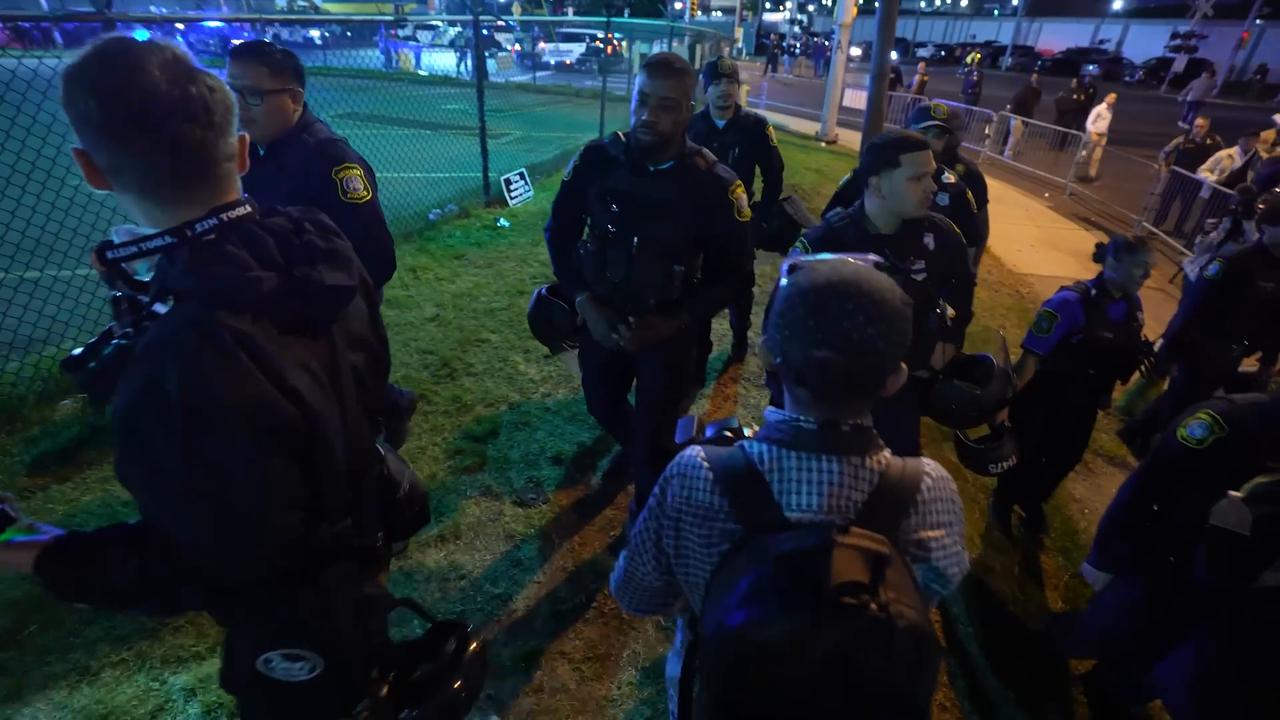 Video thumbnail for US: Police clear remaining demonstrators following curfew outside Delaney Hall.